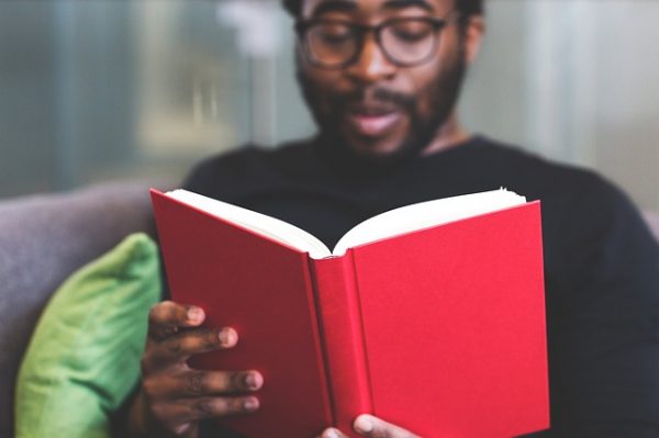 feature_man_reading_book-600×399